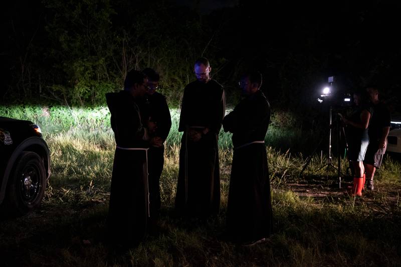 Local priests from the San Antonio Archdiocese come to the deadly scene in San Antonio, Texas. AFP