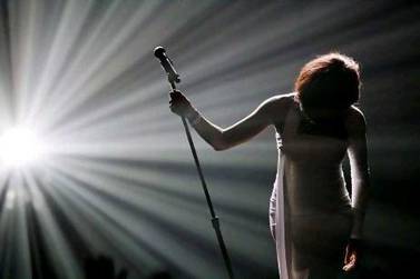 Whitney Houston bows after performing I Didn't Know My Own Strength at the 2009 American Music Awards in Los Angeles. Houston has died at age 48, media reports said on Saturday. Mario Anzuoni / Reuters