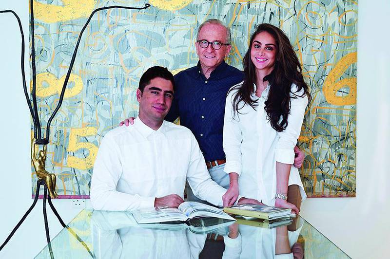 Wajih Nakkash, centre, with his children Omar and Aya, who have both joined the business. Courtesy of Nakkash Gallery.