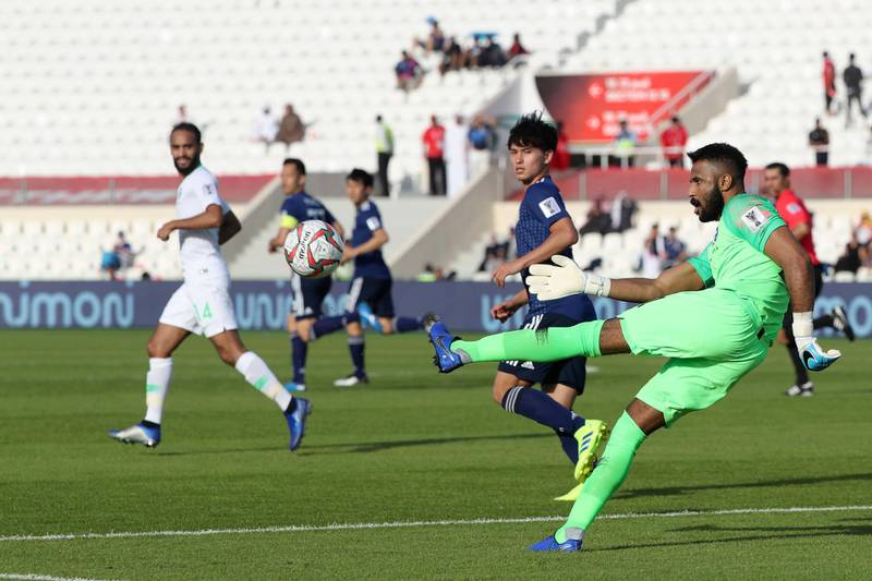 Saudi Arabia goalkeeper Mohammed Al-Owais clears the ball. AFP