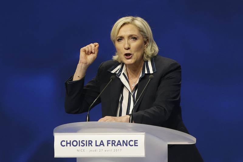 French far-right leader and presidential candidate Marine Le Pen addresses supporters during an election campaign rally in Nice, southern France. Claude Paris / AP Photo