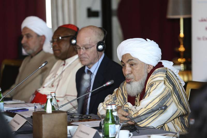 Sheikh Abdullah bin Bayyah, president of the Forum for Peace in Muslim Societies, addresses the Religions for Peace conference at St Regis Corniche Hotel in Abu Dhabi on Saturday. Sarah Dea / The National