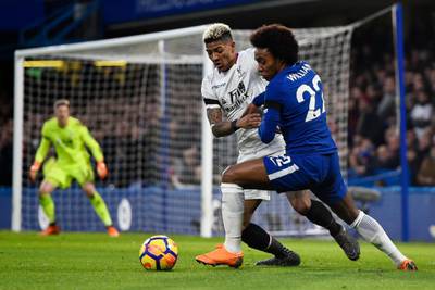 epa06594605 Chelsea's Willian (R) and Crystal Palace's Patrick van Aanholt (L) vie for the ball during the English Premier League soccer match Chelsea vs Crystal Palace at Stamford Bridge, London, Britain, 10 March 2018.  EPA/WILL OLIVER EDITORIAL USE ONLY. No use with unauthorized audio, video, data, fixture lists, club/league logos or 'live' services. Online in-match use limited to 75 images, no video emulation. No use in betting, games or single club/league/player publications