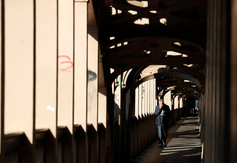 A man walks across the High Level bridge in Newcastle upon Tyne. Reuters