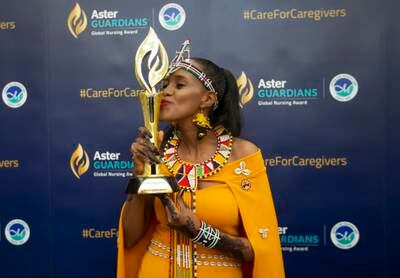 Anna Qabale Duba, winner of the Aster Guardians Global Nursing Award, kisses the trophy at the award ceremony held at The Atlantis in Dubai. All photos: Ruel Pableo / The National
