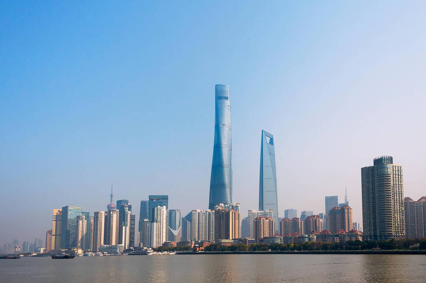 Shanghai Tower by the Huangpu River is the world's third-tallest building. Photo Alamy