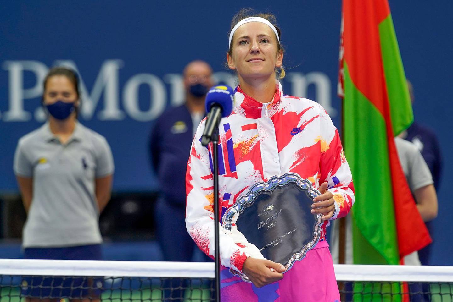 Victoria Azarenka, of Belarus, holds the runner-up trophy after losing to Naomi Osaka, of Japan, in the women's singles final of the US Open tennis championships, Saturday, Sept. 12, 2020, in New York. (AP Photo/Seth Wenig)