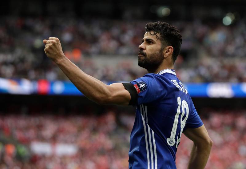 FILE - In this Saturday, May 27, 2017 file photo, Chelsea's Diego Costa celebrates scoring his team's equalizer during their English FA Cup final soccer match against Arsenal at the Wembley stadium in London. Atletico Madrid and Chelsea on Thursday, Sept. 17 say they have reached an agreement for the transfer of striker Diego Costa to the Spanish club. Chelsea says it gave Costa permission to travel to Madrid to undergo a medical and finalize the contract details with his former club. (AP Photo/Matt Dunham, file)