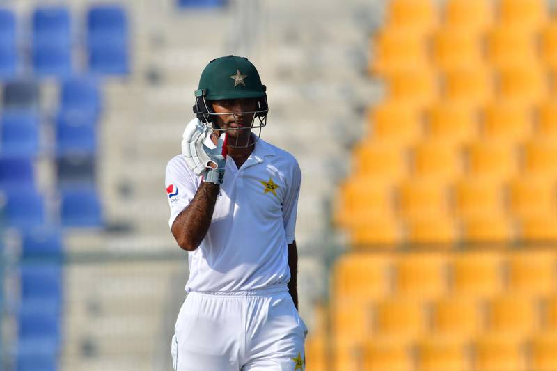 Pakistani cricketer Fakhar Zaman celebrates his half century during day two of the second Test cricket match in the series between Australia and Pakistan at the Abu Dhabi Cricket Stadium in Abu Dhabi on October 17, 2018. / AFP / GIUSEPPE CACACE
