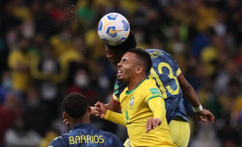 Brazil's Gabriel Jesus in action with Colombia's Yairo Moreno. Reuters