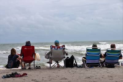 Tourists at Cocoa Beach, just south of Cape Canaveral Air Force Station