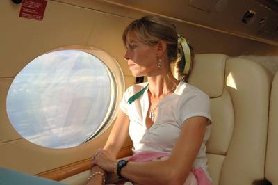 Kate McCann sits on board a private jet owned by Sir Philip Green bound for Rome and an audience with Pope Benedict XVI, at Faro Airport, Portugal in May 2007. 