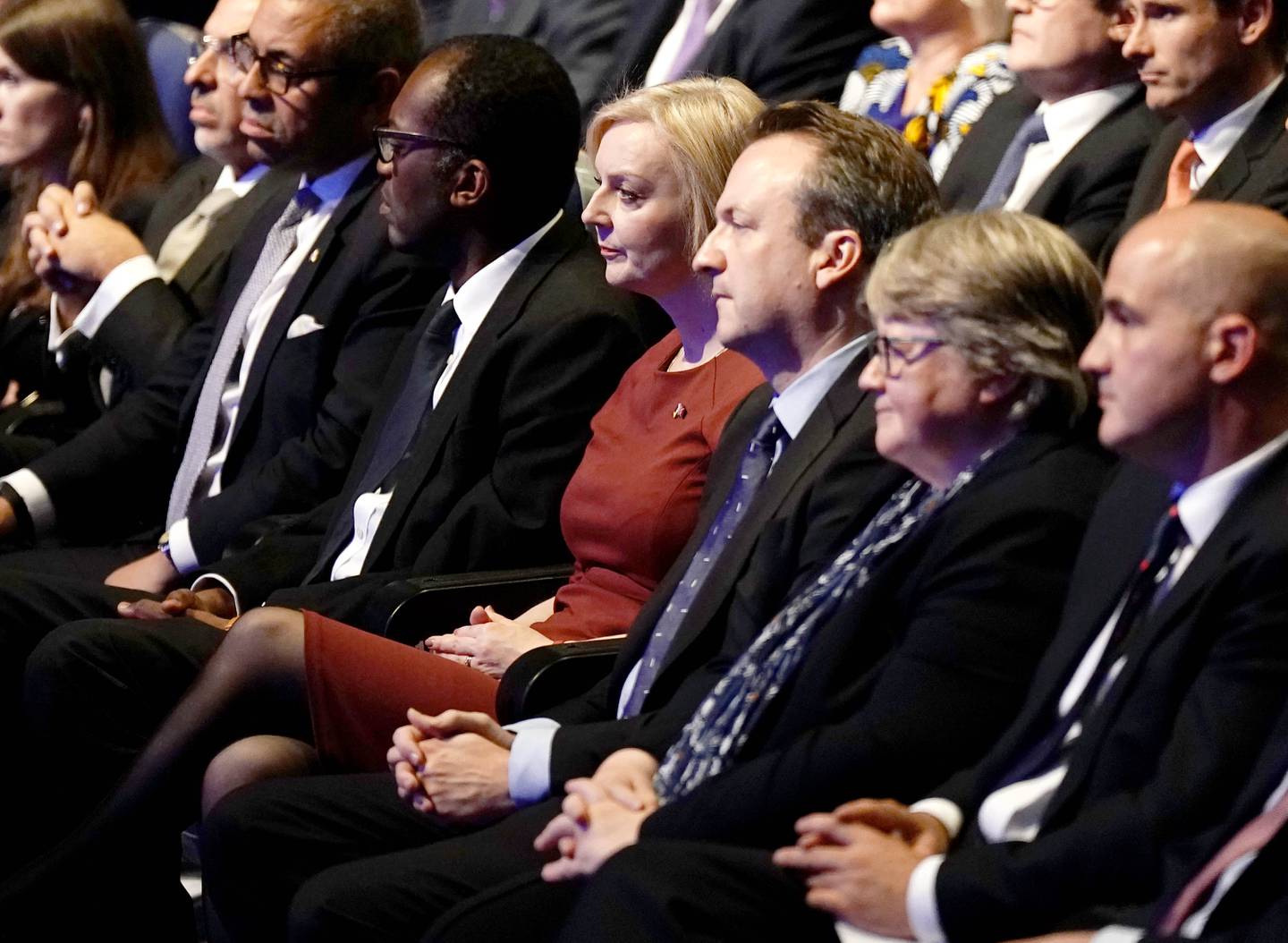 Left to right: Chancellor of the Duchy of Lancaster Nadhim Zahawi, Foreign Secretary James Cleverly, Chancellor of the Exchequer Kwasi Kwarteng, Prime Minister Liz Truss and her husband Hugh O'Leary, Deputy Prime Minister and Health Secretary Therese Coffey and Conservative party chairman Jake Berry, in Birmingham, on October 2.