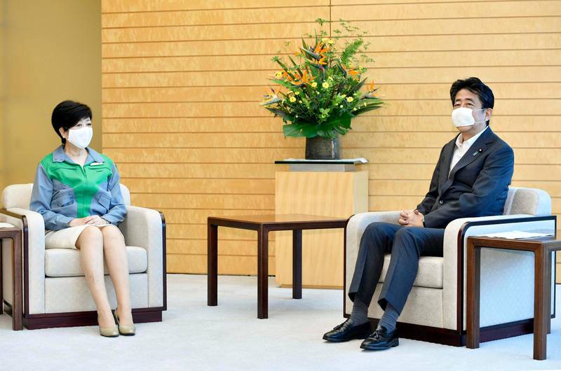 Japanese Prime Minister Shinzo Abe, left, with Tokyo governor Yuriko Koike at the prime minister's office in Tokyo. AP