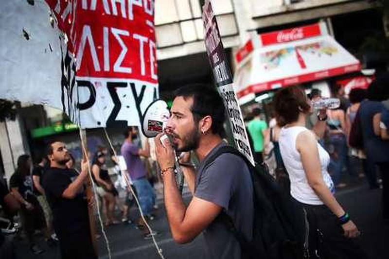 Greek protestors demonstrate in Athens. The IMF led a bailout for the country to prevent the financial crisis from spreading in Europe.