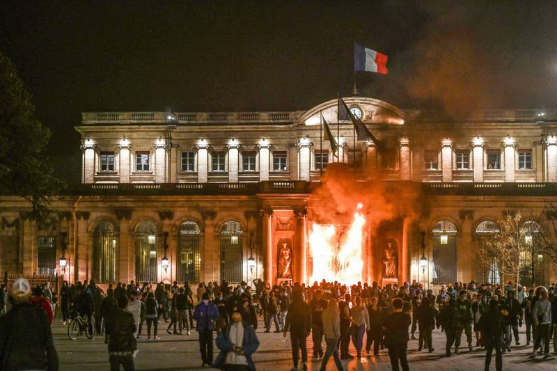 The entrance of the city hall of Bordeaux is burnt during a violent protest. Shutterstock