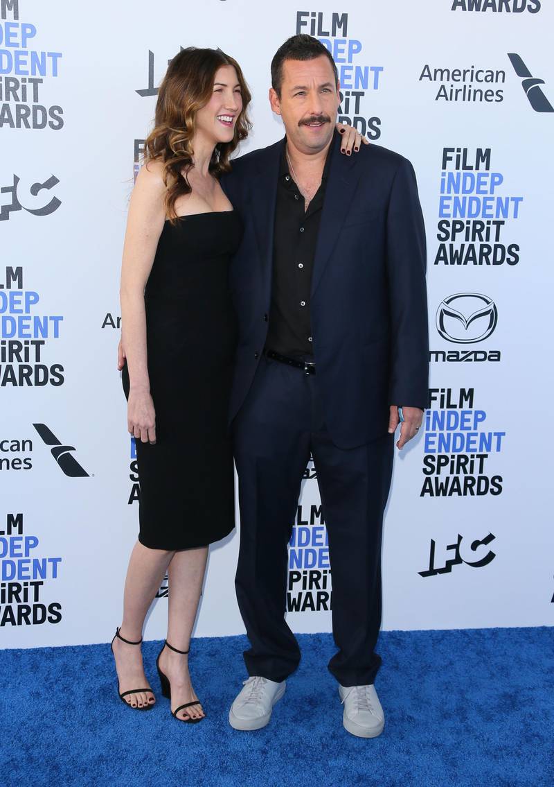 Adam Sandler and Jackie Sandler arrive for the 35th Film Independent Spirit Awards in California on February 8, 2020. AFP
