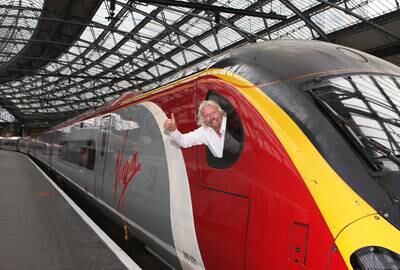 Sir Richard Branson in a Virgin train in Liverpool, England, in 2012.