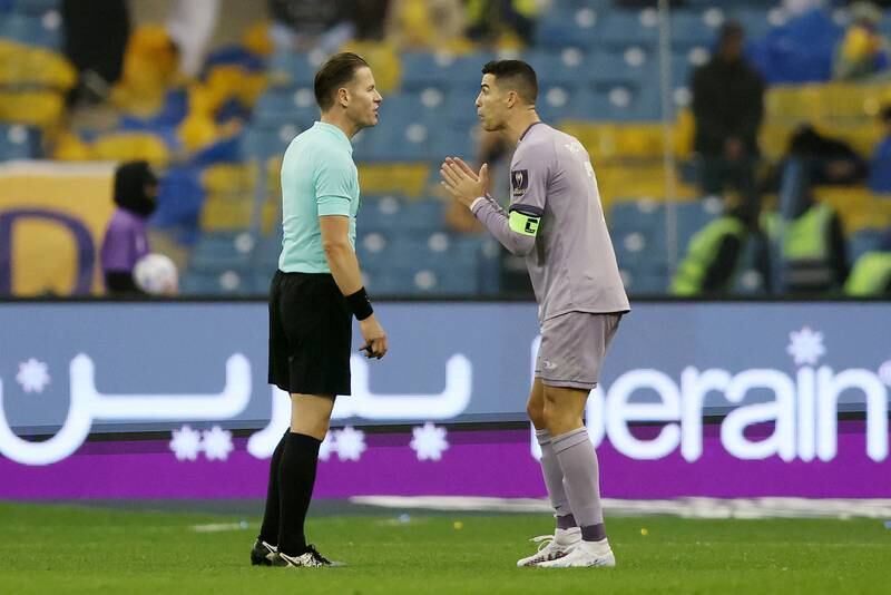 Cristiano Ronaldo of Al Nassr pleads to match referee Danny Makkelie during the Saudi Super Cup semi-final. Getty Images