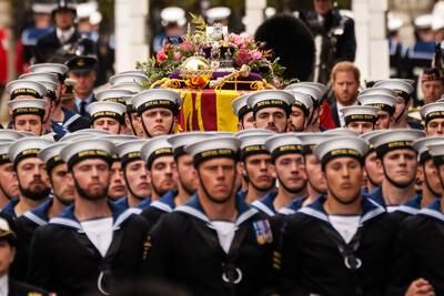 The coffin of Queen Elizabeth is pulled on a gun carriage by Royal Navy sailors to Westminster Abbey. Getty Images