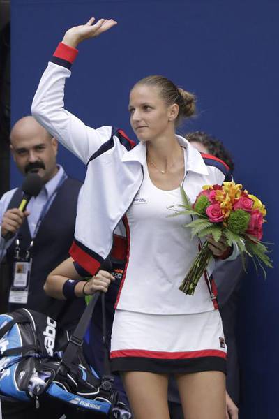 Karolina Pliskova, of the Czech Republic, walks onto the court to play Angelique Kerber, of Germany. Darron Cummings / AP Photo