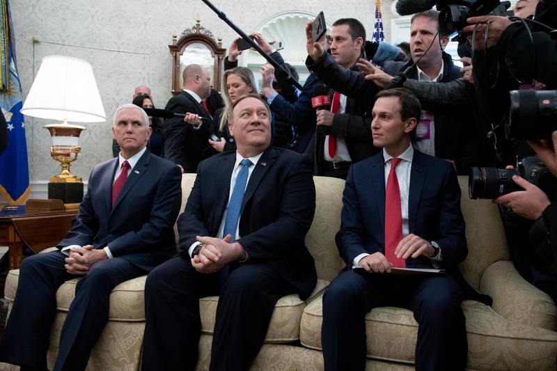 US Vice President Mike Pence (left), US Secretary of State Mike Pompeo (centre) and Senior Advisor to US President Trump Jared Kushner (right) sit beside members of the news media in the Oval Office during the meeting of Donald Trump and Benjamin Netanyahu.  EPA