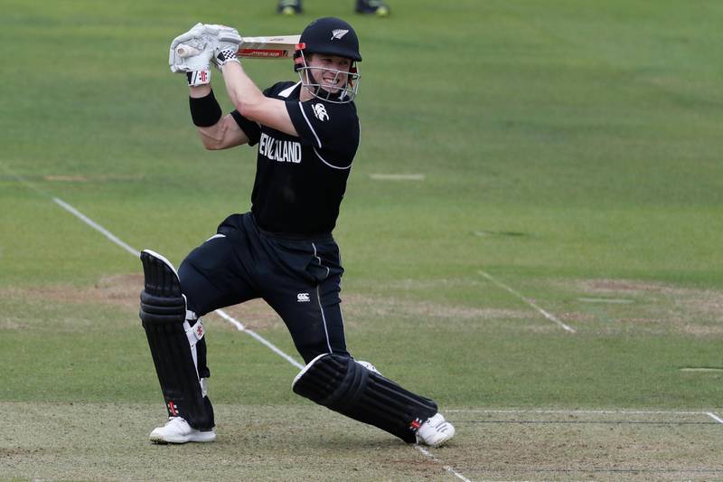 New Zealand's Henry Nicholls plays a shot off the bowling of England's Liam Plunkett during the Cricket World Cup final match between England and New Zealand at Lord's cricket ground in London, Sunday, July 14, 2019. (AP Photo/Alastair Grant)