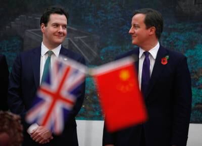 David Cameron and George Osborne at a signing ceremony at the Great Hall of the People in Beijing, in 2010. Getty Images