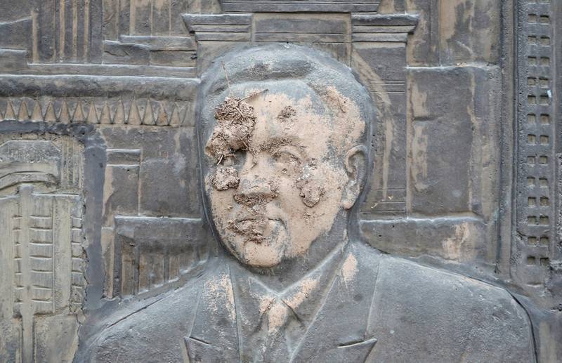 An artwork depicting independent Kazakhstan's first president Nursultan Nazarbayev, which was smeared with mud during recent protests triggered by fuel price increase. Photo: Reuters