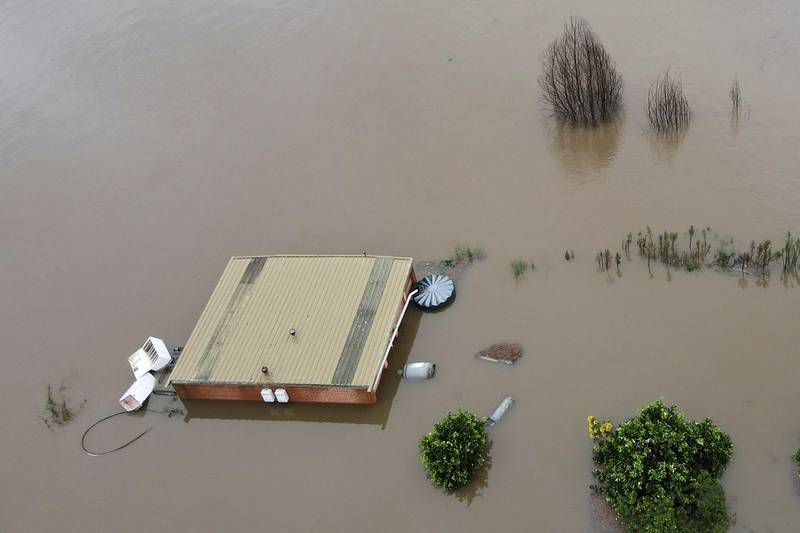 A view of orange orchards and houses that are submerged. Reuters