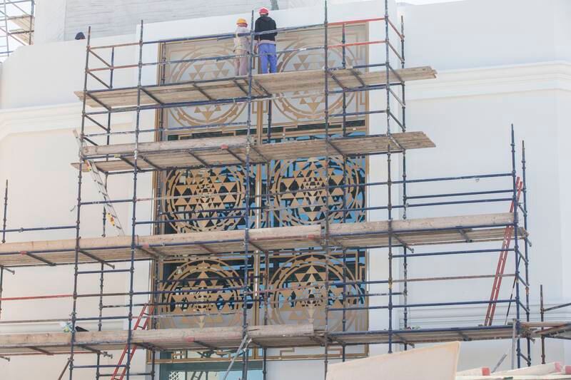 Heavy wooden doors will soon be installed at the temple.