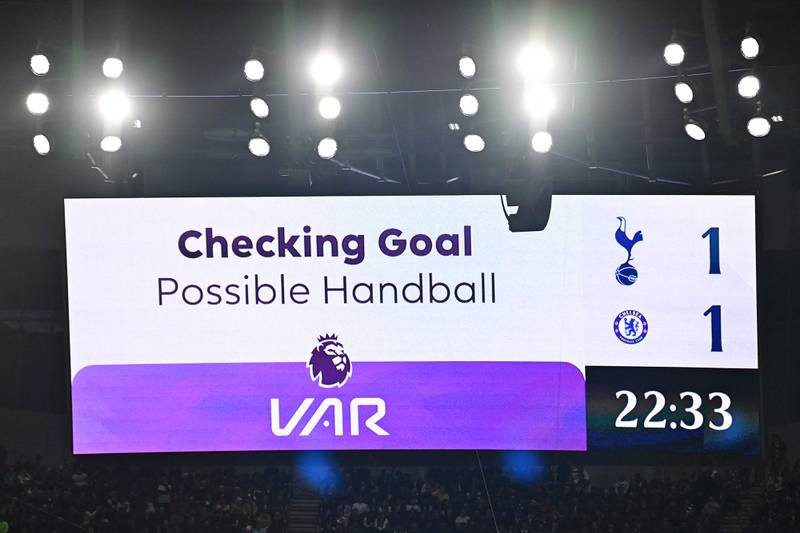 A screen shows information on a VAR check for a possible handball, leading to the disallowing of a goal by Chelsea's Raheem Sterling. AFP