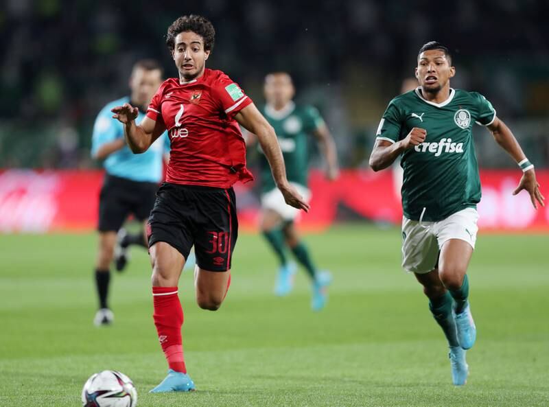 Al Ahly's Mohamed Hany is chased by Rony of Palmeiras.