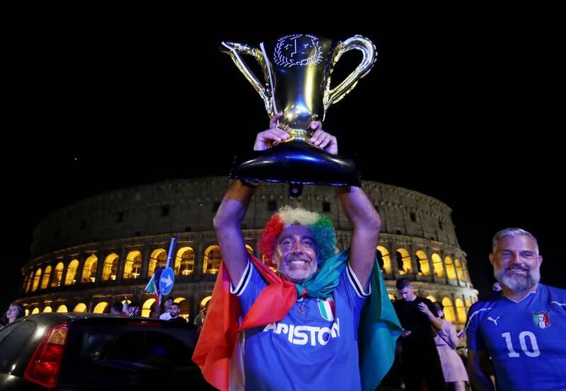 Italian fans celebrate in Rome after winning the Euro 2020 final against England at Wembley.