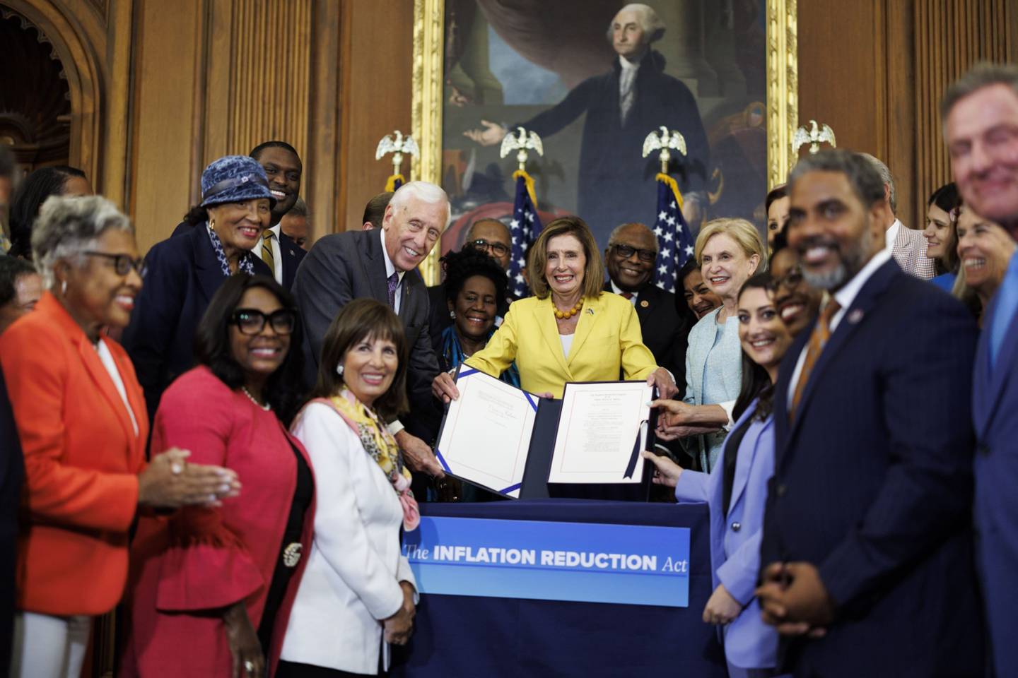 US House Speaker Nancy Pelosi holds the signed Inflation Reduction Act of 2022 during a bill enrolment ceremony at the US Capitol in Washington. Bloomberg