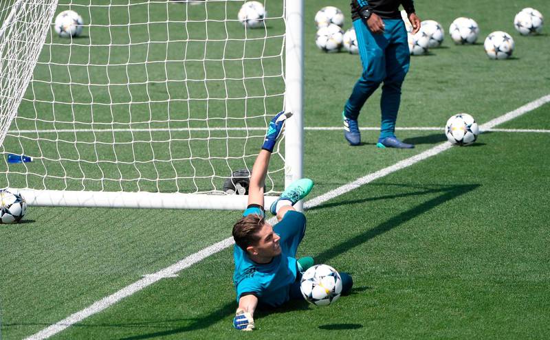 Real Madrid goalkeeper Luca Fernandez makes a save during a training session ahead of the Uefa Champions League final. Gabriel Bouys / AFP