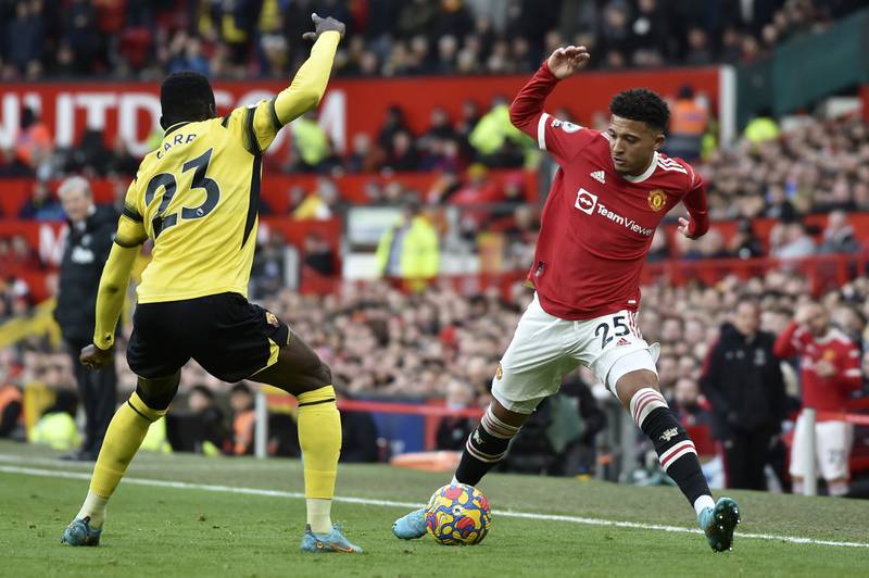 Manchester United's Jadon Sancho controls the ball in front of Watford's Ismaila Sarr. AP