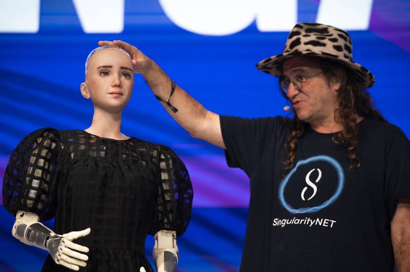 Sophia AI, a human-like robot, and Dr Ben Goertzel, chief scientist at Hanson Robotics, have a conversation at an event in Singapore last month. Bloomberg