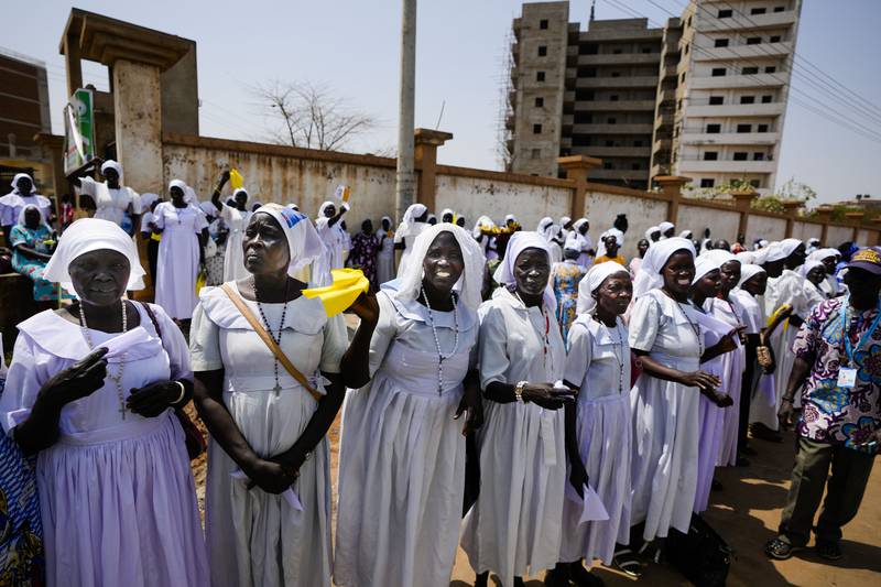 Nuns await the arrival of Pope Francis in Juba. AP