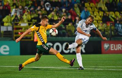 VILNIUS, LITHUANIA - OCTOBER 08:  Harry Kane of England shoots past Edvinas Girdvainis of Lithuania during the FIFA 2018 World Cup Group F Qualifier between Lithuania and England at LFF Stadium on October 8, 2017 in Vilnius, Lithuania.  (Photo by Dan Mullan/Getty Images)