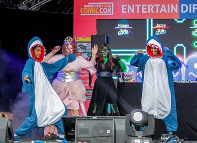 Dubai, April 12, 2019.  MEFCC day 2-Comic Con goers at full swing on day 2.  The baby sharks win the Nintendo home system. Victor Besa/The National.Section:  AC  Reporter:  Chris Newbould