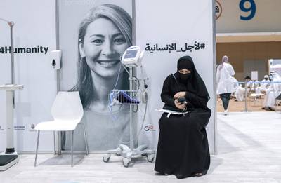 Abu Dhabi, United Arab Emirates, August 6, 2020.  A vaccine volunteer waits her turn to get a medical check up at the ADNEC volunteer facility. Victor Besa /The NationalSection: NAReporter:  Shireena Al Nowais