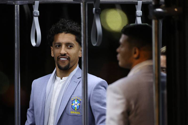Marquinhos and teammates arrive at the Hamad International Airport. AFP