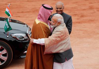Saudi Arabia's Crown Prince Mohammed bin Salman is greeted by India's Prime Minister Narendra Modi as President Ram Nath Kovind watches during his ceremonial reception at the forecourt of Rashtrapati Bhavan presidential palace in New Delhi, India, February 20, 2019. REUTERS/Adnan Abidi