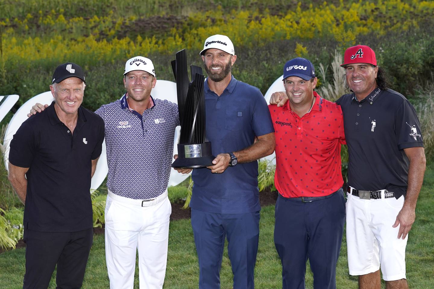 Dustin Johnson, centre, led the 4 Aces GC to another team victory at LIV Golf Invitational-Chicago. AP