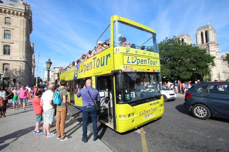 A tourist bus in Paris. Courtesy Wikimedia Commons / Lionel Allorge