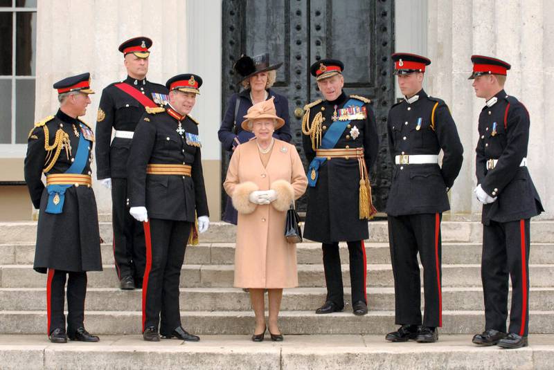 SANDHURST, ENGLAND - APRIL 12:  Prince Charles, Prince of Wales (L),  General Sir Michael Jackson (2nd from right) Prince William (2nd right), Prince Harry (R), Prince Philip, Duke of Edinburgh, Queen Elizabeth II and Camilla, Duchess of Cornwall pose together after the passing-out Sovereign's Parade at Sandhurst Military Academy on April 12, 2006 in Sandhurst, England. (Photo by Anwar Hussein/Getty Images)