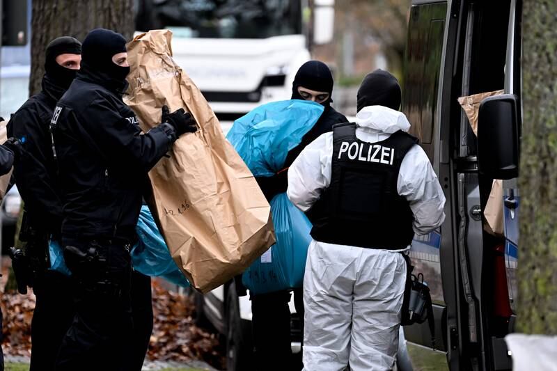 Police in Berlin during a raid against suspected terrorist plotters. EPA