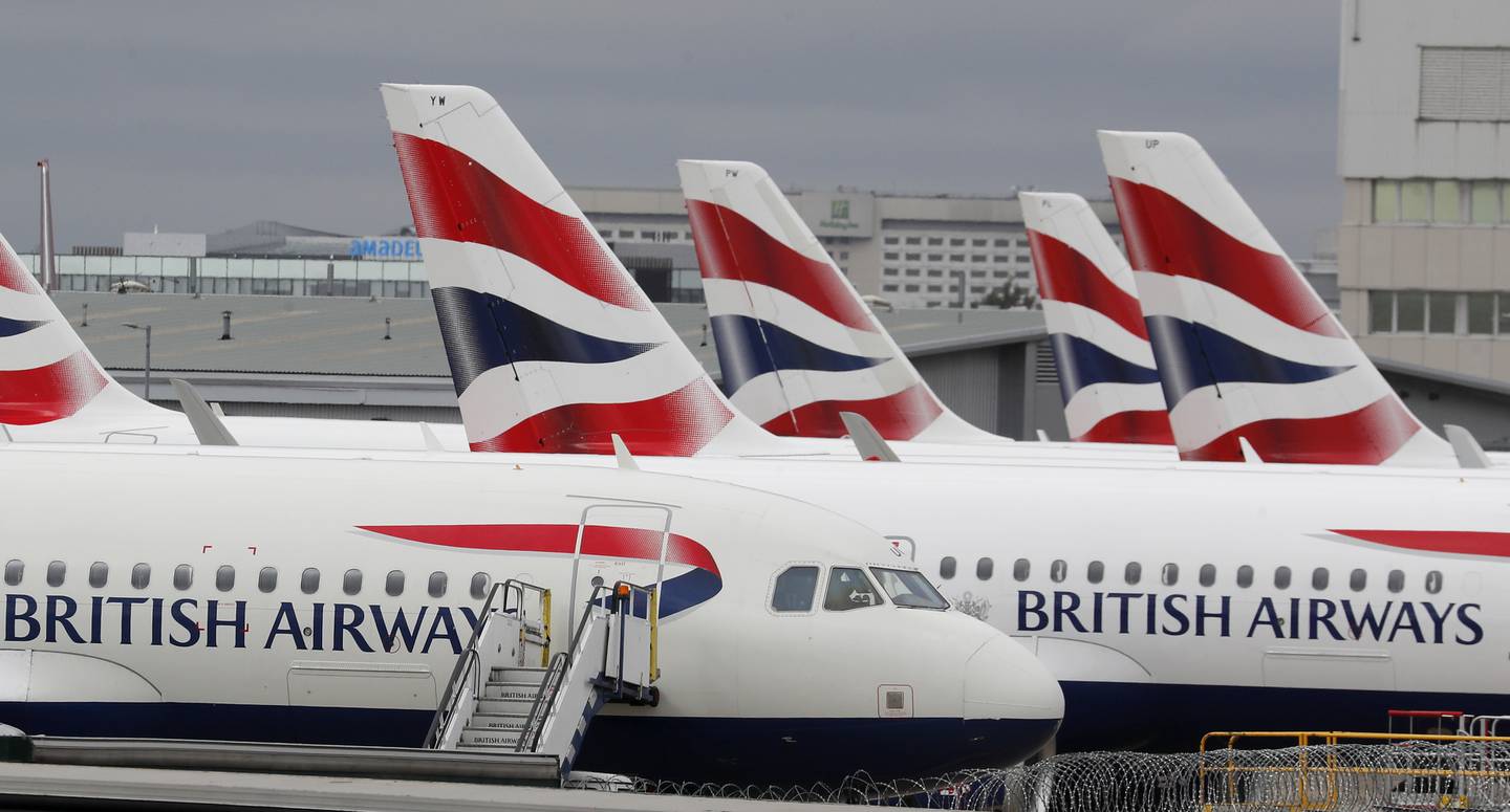 British Airways is cutting more than 10,000 short-haul flights in and out of Heathrow Airport until March next year. AP Photo