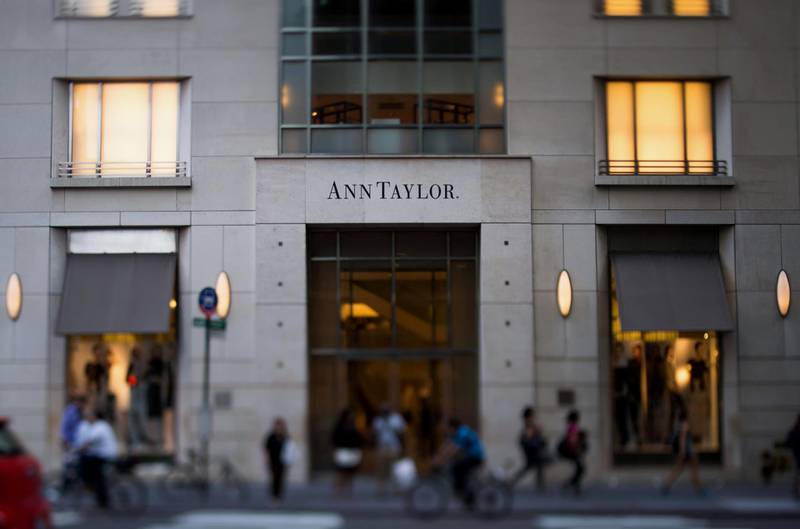 Pedestrians walk past an Ann Taylor Inc. store in this photo taken with a tilt-shift lens on Madison Avenue in New York, U.S., on Wednesday, Sept. 3, 2014. The Bloomberg Consumer Comfort Index, a survey which measures attitudes about the economy, is scheduled to be released on Sept. 11. Photographer: Ron Antonelli/Bloomberg